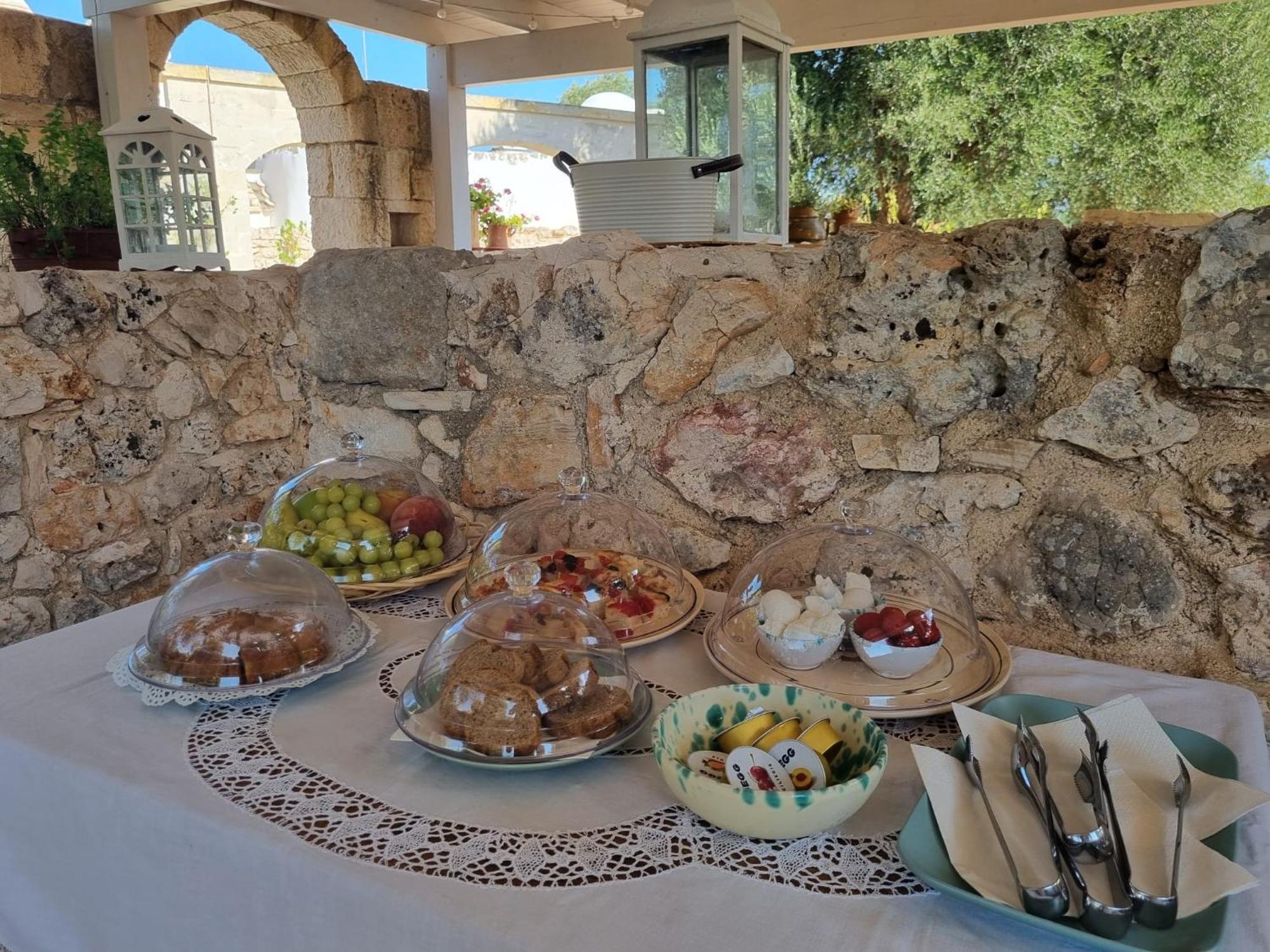 Trulli Di Spinaruta Bed & Breakfast กร็อตตาเย ภายนอก รูปภาพ